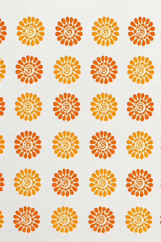A grid of repeated mini marigold drawings across a page, each with a spiral center and small comma-stroke petals, colored in alternating orange shades.