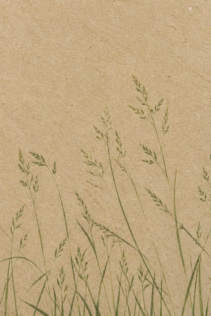 Kraft paper has grass blades drawn in green ink, with tan shadows that look like linen fibers. The seed heads are small and light.